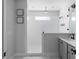 Bright bathroom showcasing a walk-in shower with white subway tile and a glass enclosure at 2736 Bell Se Dr, Smyrna, GA 30080