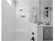 Modern bathroom with a walk-in shower featuring a built-in bench and stylish fixtures at 2736 Bell Se Dr, Smyrna, GA 30080