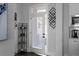 Cozy mudroom features decor and leads to the kitchen with white cabinets at 2736 Bell Se Dr, Smyrna, GA 30080