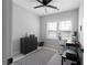 Well-lit home office space with a large window, patterned rug, and modern desk setup at 2736 Bell Se Dr, Smyrna, GA 30080
