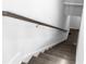 Interior staircase with hardwood steps and painted risers lead to the upper level at 2736 Bell Se Dr, Smyrna, GA 30080