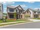 Charming two-story brick home with an attached garage, showcasing curb appeal and landscaping at 5340 Candun Cir, Sugar Hill, GA 30518