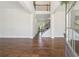 Spacious foyer with high ceilings, hardwood floors, and an open staircase creates a grand entrance at 5340 Candun Cir, Sugar Hill, GA 30518