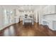 Open concept kitchen with a center island, stainless steel appliances, and white cabinets at 5340 Candun Cir, Sugar Hill, GA 30518