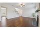 Spacious living room with hardwood floors and staircase view at 5340 Candun Cir, Sugar Hill, GA 30518