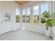 Sunroom with many windows and door at 5340 Candun Cir, Sugar Hill, GA 30518
