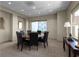Community conference room with round table, seating, natural light and side table with decor at 3475 Oak Valley Ne Rd # 2820, Atlanta, GA 30326
