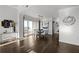 Bright dining room featuring hardwood floors, modern decor, and large windows at 3475 Oak Valley Ne Rd # 2820, Atlanta, GA 30326