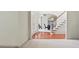 Open entryway with staircase, wood floors, and view into the dining area create an inviting space at 3688 Eagles Beek Cir, Lithonia, GA 30038
