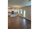 Spacious open-concept kitchen with a center island, stainless steel appliances, and modern finishes at 1857 Kingsmere Run Dr, Loganville, GA 30052