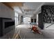 Open living room featuring custom fireplace and wall textures, ready for your personal design touches at 5210 Brownlee Rd, Stone Mountain, GA 30087
