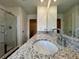 Bathroom with double sinks, walk-in shower, and private toilet at 1909 Victoria Way # 116, Conyers, GA 30013