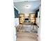Elegant home office with custom shelves, hardwood floors, and a large desk at 410 Anglin Walk, Alpharetta, GA 30009