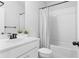 Updated bathroom with white subway tile tub surround, a single sink vanity, and chrome hardware at 1190 Buice Lake Pkwy, Acworth, GA 30102