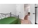 Comfortable bedroom featuring a plush carpet, neutral walls, and access to the hallway at 1190 Buice Lake Pkwy, Acworth, GA 30102