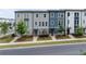Charming townhomes feature varied colors and landscaping for curb appeal at 1190 Buice Lake Pkwy, Acworth, GA 30102