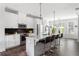 Modern kitchen with stainless appliances, oversized island and barstool seating at 1190 Buice Lake Pkwy, Acworth, GA 30102