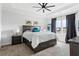 Spacious main bedroom with tray ceiling, carpet floors, and ensuite bathroom at 1190 Buice Lake Pkwy, Acworth, GA 30102