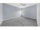 An expansive bedroom with neutral walls and plush carpeting at 5345 Mirror Lake Dr, Cumming, GA 30028