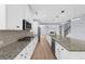 Gourmet kitchen with granite countertops, stainless appliances, and custom cabinets at 5345 Mirror Lake Dr, Cumming, GA 30028