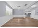 Bright living room featuring lovely floors, soft walls, and elegant lighting at 5345 Mirror Lake Dr, Cumming, GA 30028