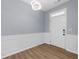 Bright living room featuring lovely floors, soft walls, and modern lighting at 5345 Mirror Lake Dr, Cumming, GA 30028