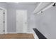 Convenient mudroom with built-in bench and shelving, offering practical storage solutions at 5345 Mirror Lake Dr, Cumming, GA 30028