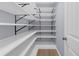 Well-organized walk-in pantry with ample shelving space, ideal for storing groceries and kitchen essentials at 5345 Mirror Lake Dr, Cumming, GA 30028