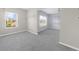 Walk-in closet with an open layout and built in shelving to efficiently organize storage and clothes at 5345 Mirror Lake Dr, Cumming, GA 30028