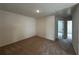 Cozy bedroom with neutral carpet, ample space, and well-lit, offering a comfortable retreat at 1911 Victoria Way # 117, Conyers, GA 30013