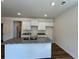 Well-equipped kitchen with granite countertops and a functional island, perfect for meal preparation and casual dining at 1911 Victoria Way # 117, Conyers, GA 30013