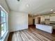 Open-concept living area with abundant natural light, modern flooring, and easy access to the kitchen at 1911 Victoria Way # 117, Conyers, GA 30013