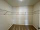 Spacious walk-in closet with shelving for optimal storage at 1911 Victoria Way # 117, Conyers, GA 30013