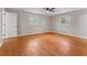 Spacious bedroom with gleaming hardwood floors and lots of natural light at 2002 Twin Falls Rd, Decatur, GA 30032