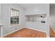 Bright dining area with an opening view of the living room fireplace at 2002 Twin Falls Rd, Decatur, GA 30032