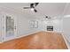 Spacious living room with a brick fireplace and a door leading to the backyard at 2002 Twin Falls Rd, Decatur, GA 30032