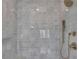 Modern shower with tile surround, rain shower head, and niche at 2875 Caney Parc Way, Cumming, GA 30041
