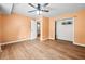 Bedroom featuring wood floors, an ensuite bathroom, and closet at 3049 Heathgate Ct, Lawrenceville, GA 30044