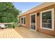 Cozy outdoor deck with seating and natural light and home access at 3049 Heathgate Ct, Lawrenceville, GA 30044