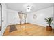 Bright living room features hardwood floors, white walls, and plenty of natural light at 3049 Heathgate Ct, Lawrenceville, GA 30044