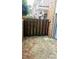 View of the home's concrete patio with wood fence and sliding glass doors, extending the living space outdoors at 4701 Flat Shoals Rd # 68D, Union City, GA 30291