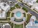 Overhead view of the community pool surrounded by manicured lawns, walkways, and residences at 323 S Esplanade, Alpharetta, GA 30009