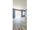 Bright living area with hardwood flooring and a sliding glass door leading to outdoor space at 4701 Flat Shoals Rd # 25F, Union City, GA 30291