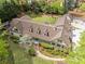 Expansive home with manicured lawn, putting green, charming landscaping, and a long driveway at 299 Saint Marys Nw Ln, Marietta, GA 30064