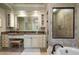 Elegant bathroom with large vanity, soaking tub, and glass-enclosed shower at 299 Saint Marys Nw Ln, Marietta, GA 30064
