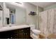 Bathroom featuring a vanity, toilet, shower and neutral walls at 1137 Eagles Nest Cir, Carrollton, GA 30116
