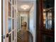 Elegant hallway with hardwood floors, providing seamless transitions between rooms, adding to the home's flow at 1137 Eagles Nest Cir, Carrollton, GA 30116