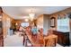 The living area showcases neutral tones, elegant lighting, fireplace, and ample seating area at 1137 Eagles Nest Cir, Carrollton, GA 30116