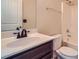 Bathroom features a single sink vanity with a combined shower and bathtub at 3677 Trillium Forest Dr, Snellville, GA 30039