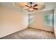 Bright and airy bedroom features a ceiling fan and natural light streaming through the window at 3677 Trillium Forest Dr, Snellville, GA 30039